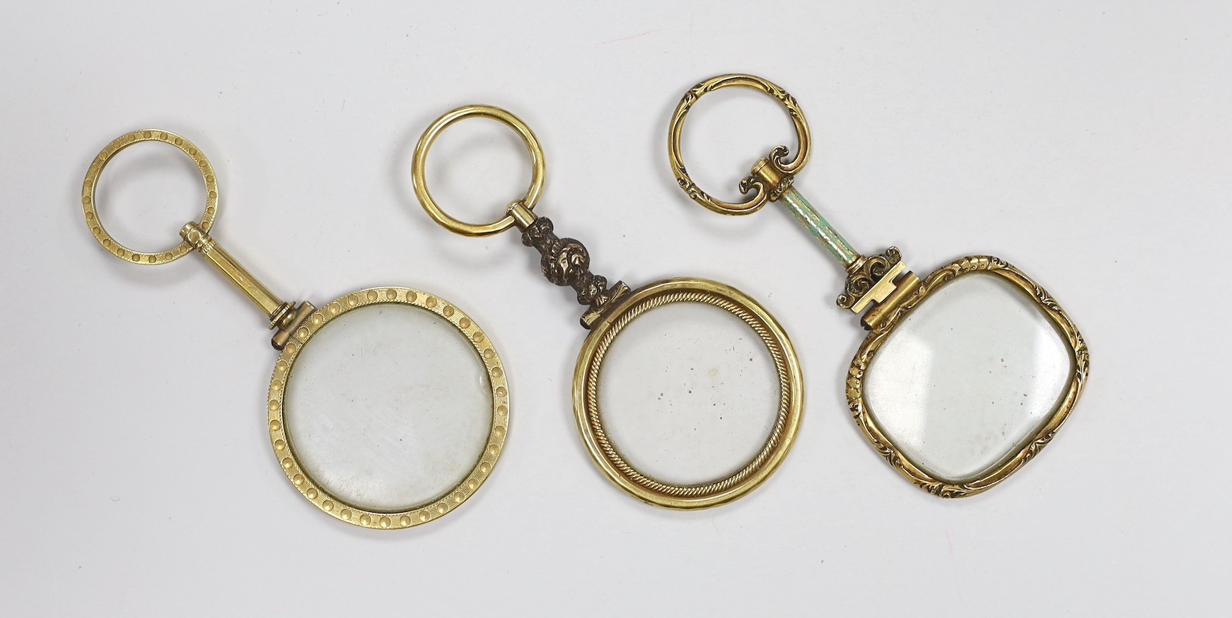 Two 19th century tortoiseshell and horn snuff boxes and three decorative gilt metal monocles